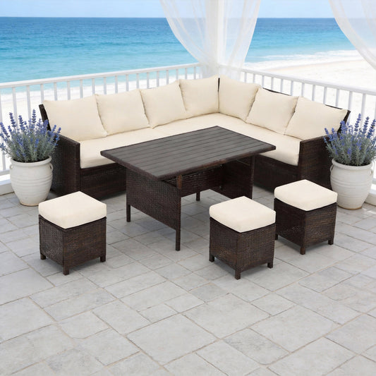 Emootto 7-Piece Outdoor Rattan Sectional Dining Set - 9-Seat All-Weather Wicker Sofa with 3 Ottomans and Large Wood-Look Dining Table, Brown with Ivory Cushions